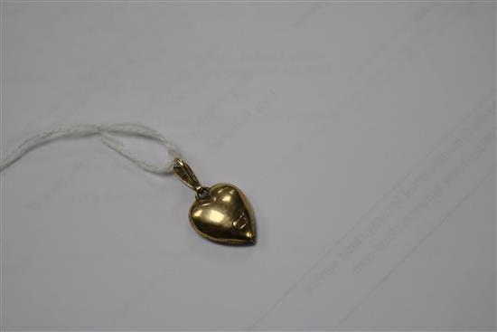 A yellow metal, green garnet, ruby and split pearl set heart shaped pendant, stamped 9ct, overall 30mm.